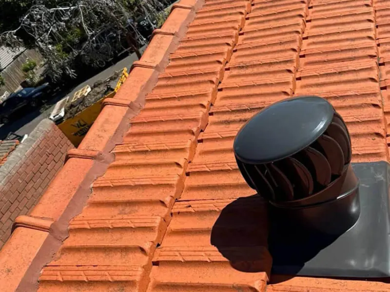 Tiled roof with ridge capping and roof vent in Melbourne, Metro Wide Roofing