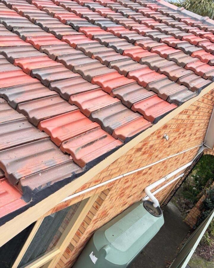 Roof washing in progress on a tiled roof in Melbourne, Metro Wide Roofing