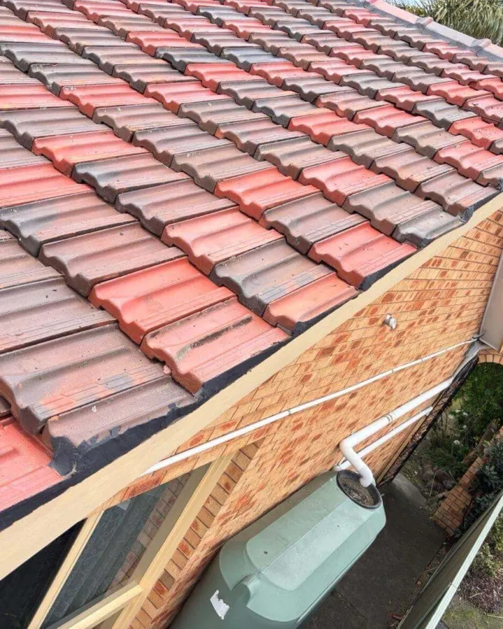 Roof washing in progress on a tiled roof in Melbourne, Metro Wide Roofing