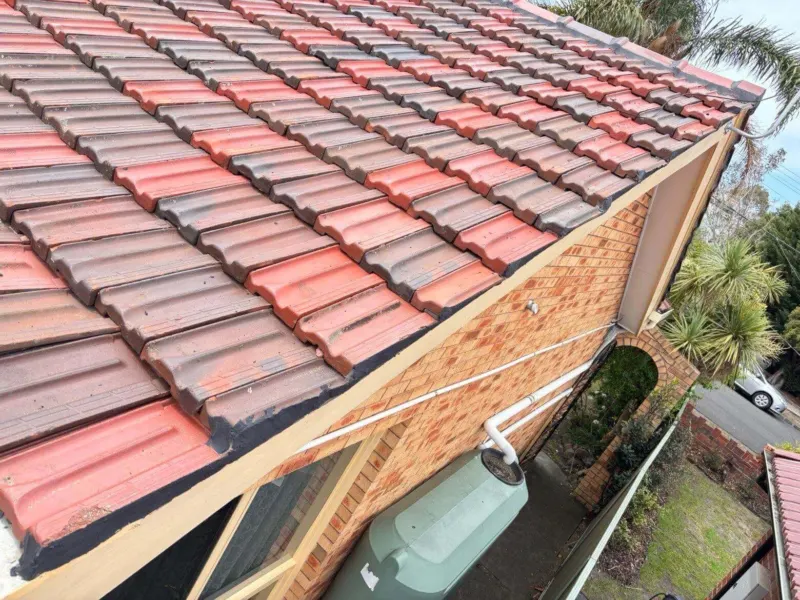 Roof washing in progress on a tiled roof in Melbourne, Metro Wide Roofing